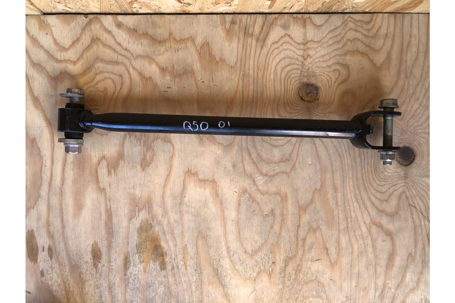 Рычаг задний нижний